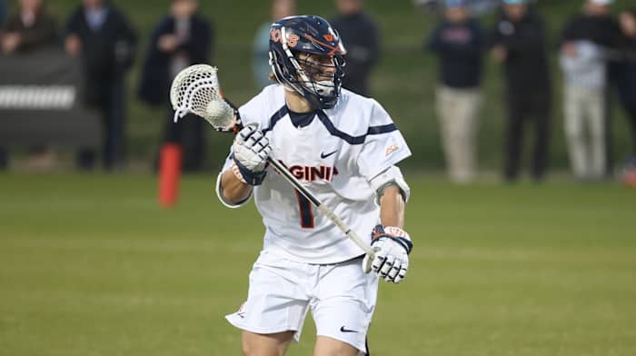 Connor Shellenberger cradles the ball during the Virginia men's lacrosse game against Richmond at Klockner Stadium.